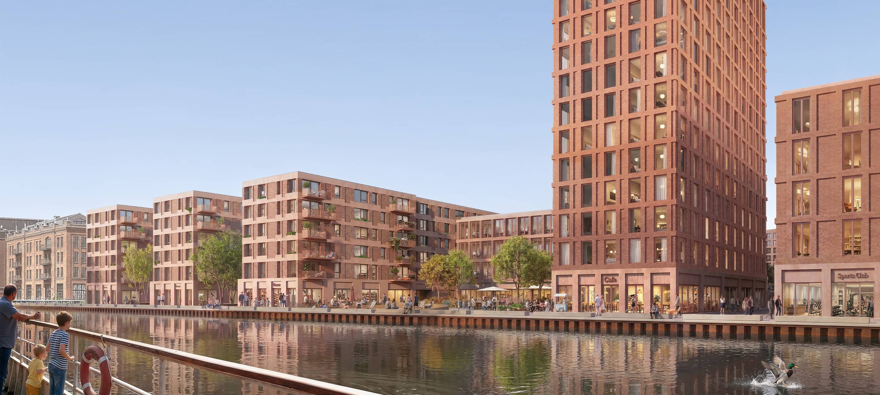 Auf der Brachfläche zwischen Hafenweg und Hafenbecken sollen unter anderem drei Wohngebäude (links) und ein Hotel mit Rooftop-Bar (rechts) entstehen.